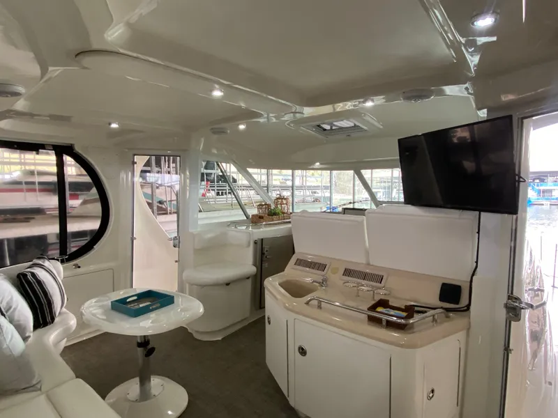 Slide: The Image of 2006 Sea Ray 40 Motor Yacht interior with modern amenities and elegant design. - 5