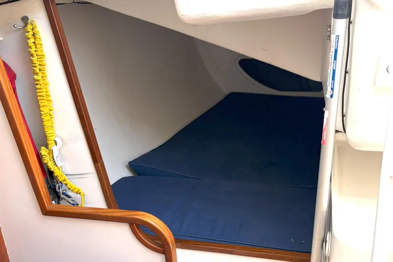 Slide: The Image of Interior cabin of 2015 J Boats J 111 sailboat with blue cushions. - 15