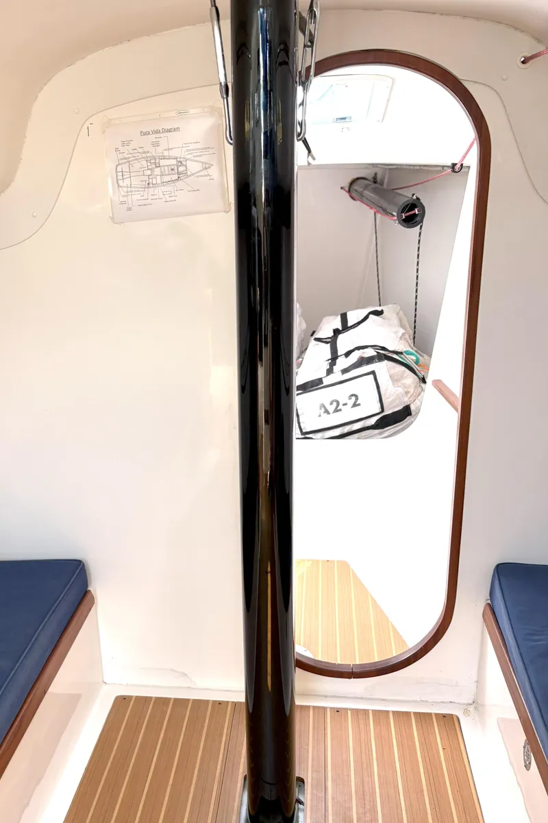 Slide: The Image of Interior of 2015 J Boats J 111 sailboat, featuring sleek design and wooden flooring. - 18