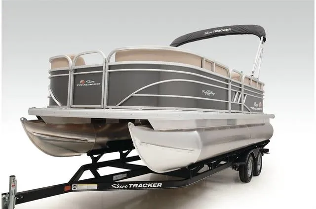 Slide: The Image of 2021 Sun Tracker Party Barge 20 DLX pontoon boat on trailer, side view. - 22