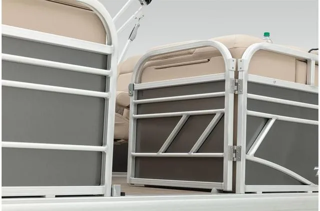 Slide: The Image of 2021 Sun Tracker Party Barge 20 DLX pontoon boat with beige seating and metal railings. - 25