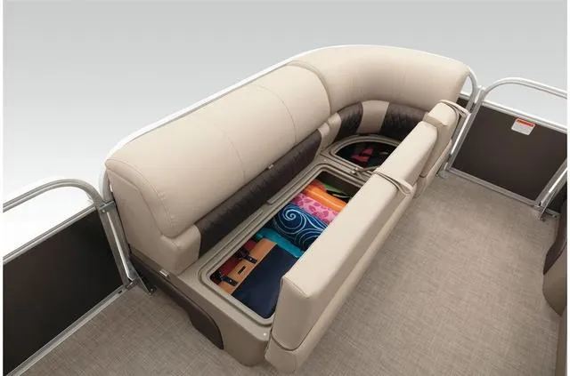 Slide: The Image of 2021 Sun Tracker Party Barge 20 DLX with open storage under beige seating. - 31