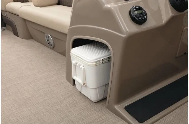 Slide: The Image of 2021 Sun Tracker Party Barge 20 DLX interior with cooler storage and seating. - 32