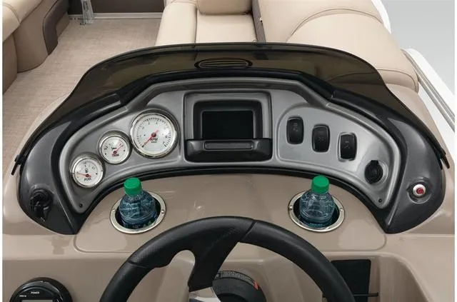 Slide: The Image of Dashboard of 2021 Sun Tracker Party Barge 20 DLX with gauges and cup holders. - 35