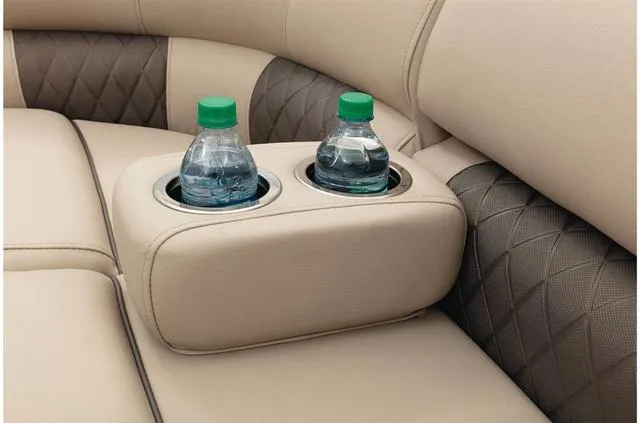 Slide: The Image of Cup holders with water bottles on Sun Tracker Party Barge 20 DLX 2021 boat seats. - 40
