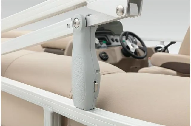 Slide: The Image of 2021 Sun Tracker Party Barge 20 DLX interior with steering wheel and seating detail. - 49