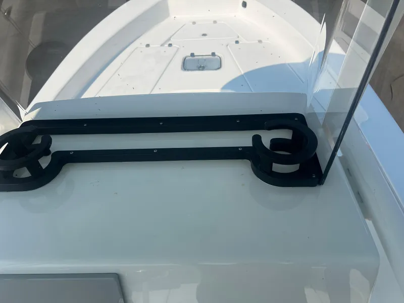 Slide: The Image of 2025 Pair Customs 24 Bay boat deck with sleek design and modern features. - 11