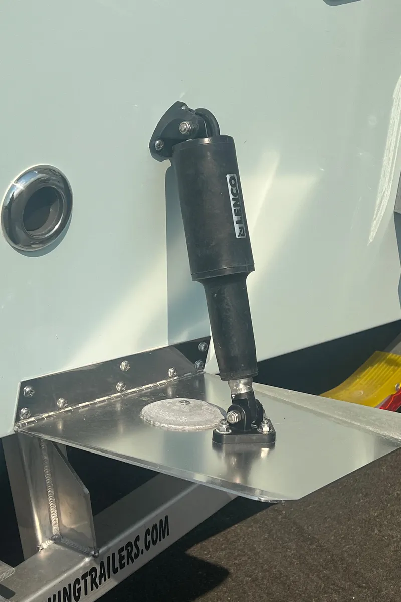 Slide: The Image of Shock absorber on a 2025 Pair Customs 24 Bay trailer. - 17