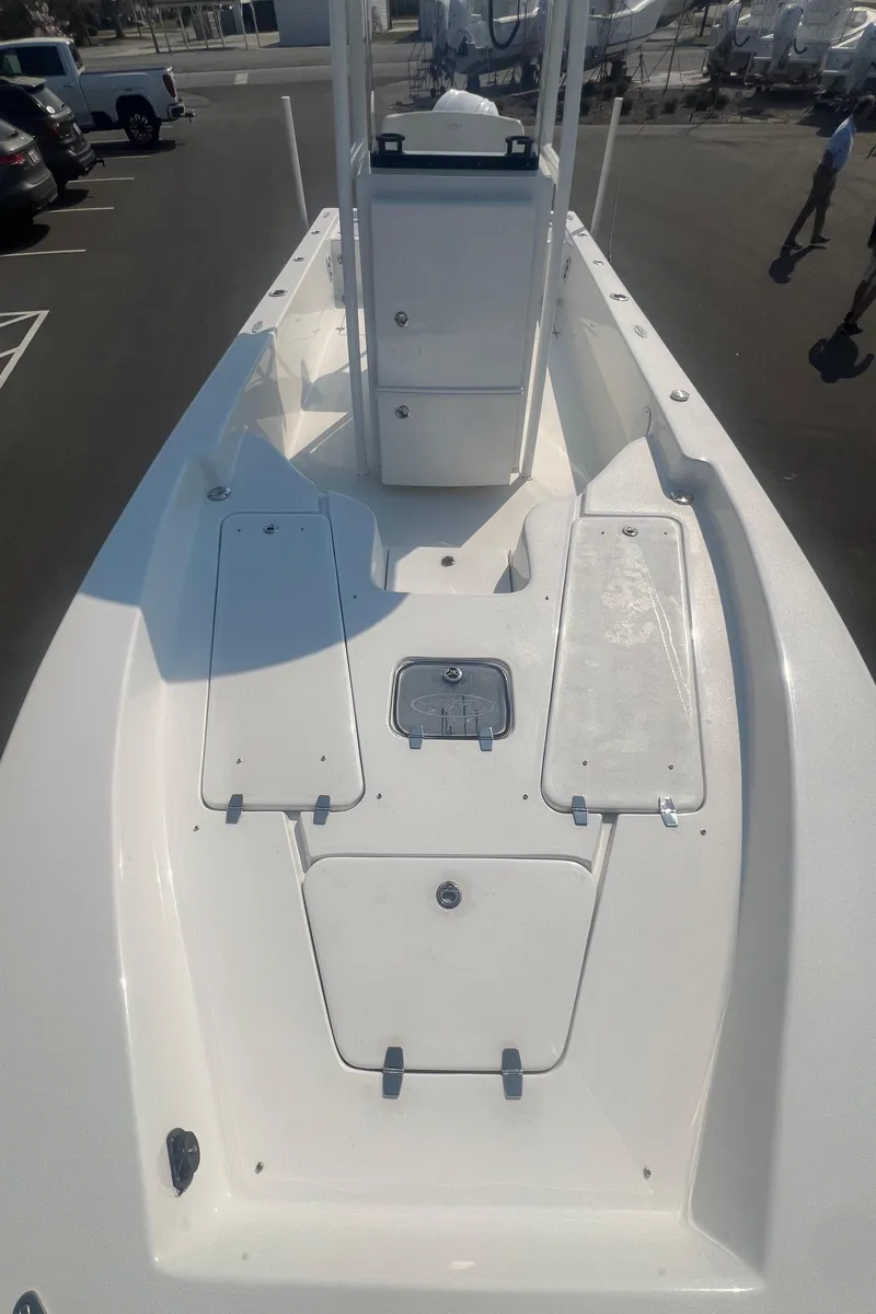 Slide: The Image of 2025 Pair Customs 24 Bay boat, white deck, center console, spacious layout. - 31