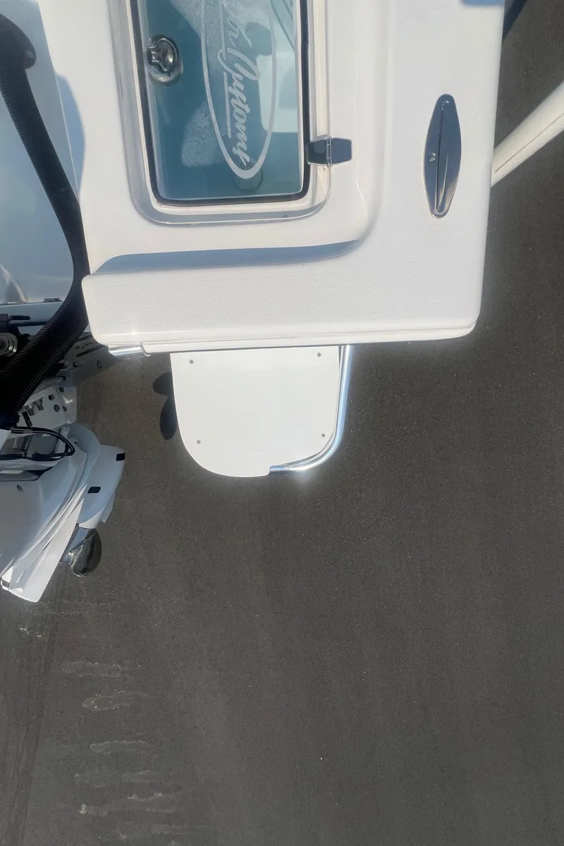 Slide: The Image of 2025 Pair Customs 24 Bay boat, white deck, sleek design. - 39