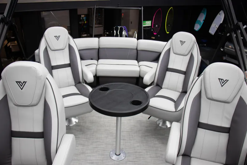 Slide: The Image of Luxurious interior of 2025 Viaggio Lago X-Q boat with plush seating and central table. - 13