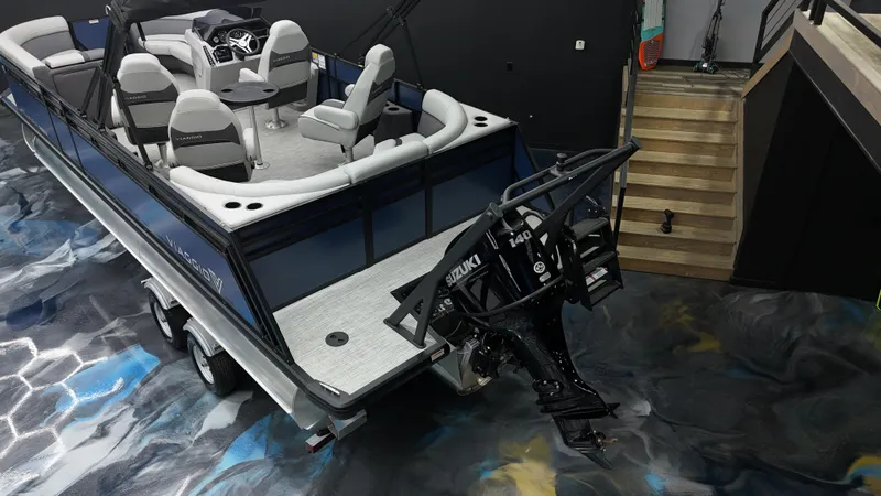 Slide: The Image of 2025 Viaggio Lago X-Q boat with Suzuki outboard motor in showroom. - 14