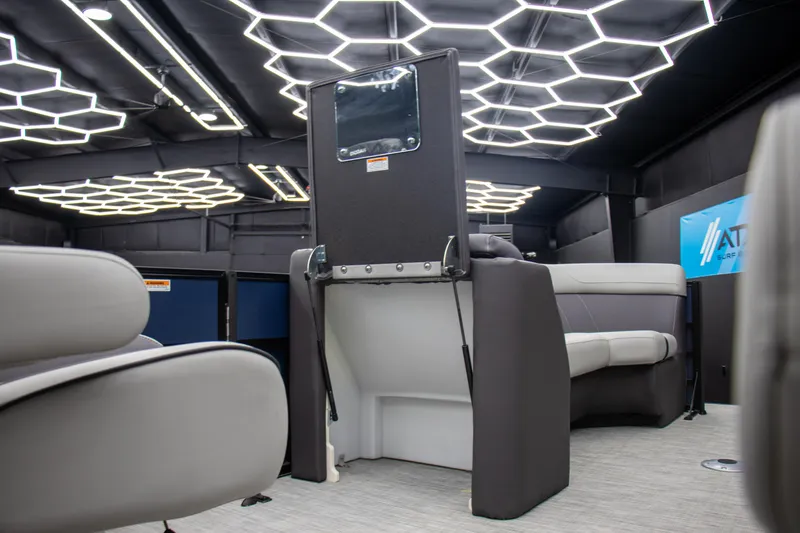 Slide: The Image of Luxurious interior of 2025 Viaggio Lago X-Q with modern seating and hexagonal lighting. - 15