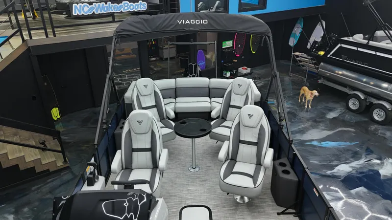 Slide: The Image of 2025 Viaggio Lago X-Q boat interior with luxurious seating and modern design. - 16