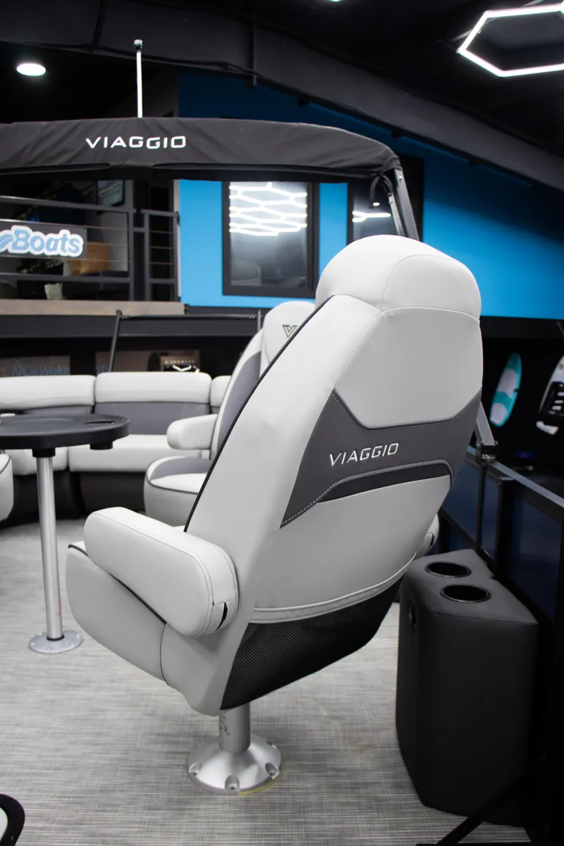 Slide: The Image of 2025 Viaggio Lago X-Q boat interior with modern seating and sleek design. - 18