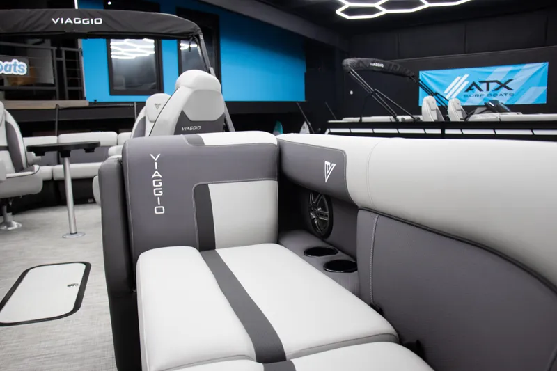 Slide: The Image of 2025 Viaggio Lago X-Q boat interior with modern seating and sleek design. - 19