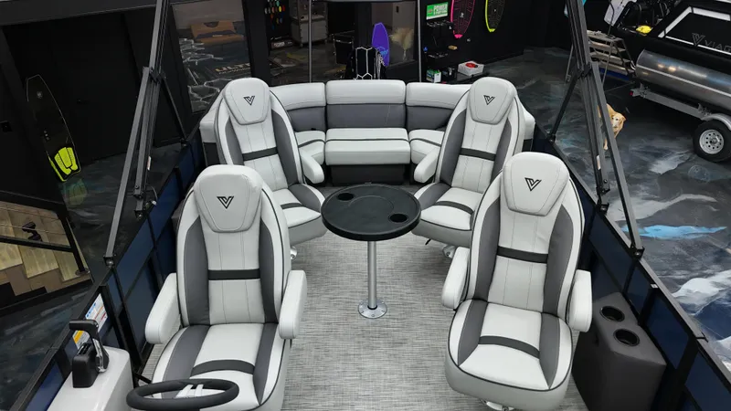 Slide: The Image of Luxurious 2025 Viaggio Lago X-Q boat interior with plush seating and central table. - 3