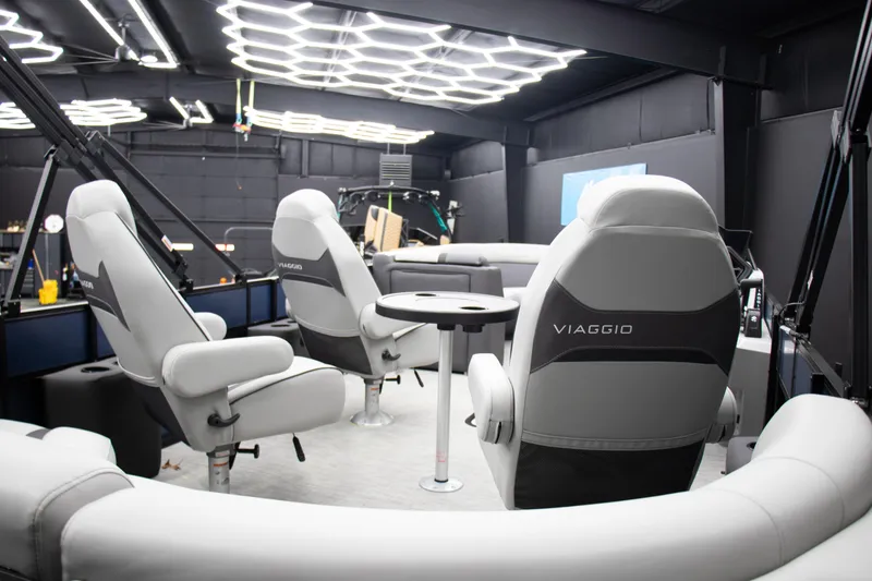 Slide: The Image of Interior of 2025 Viaggio Lago X-Q boat with modern seating and lighting. - 9