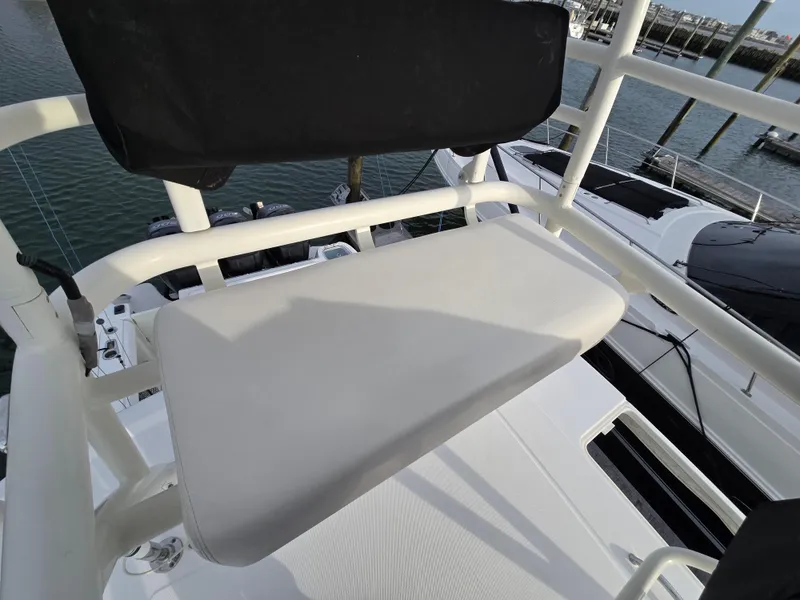 Slide: The Image of Boston Whaler 350 Outrage 2015 boat seat with marina view. - 27