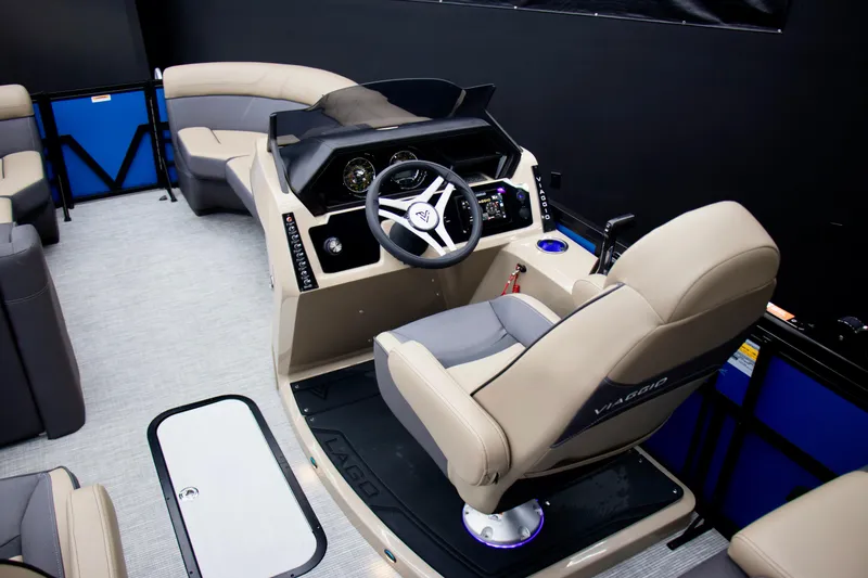 Slide: The Image of 2025 Viaggio Lago Z-U boat interior with modern helm and comfortable seating. - 16