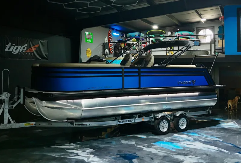 Slide: The Image of 2025 Viaggio Lago Z-U pontoon boat on trailer in showroom. - 18