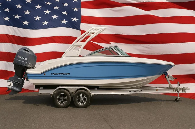 The Image of 2025 Chaparral 21 SSi OB boat on trailer, American flag background. - 0