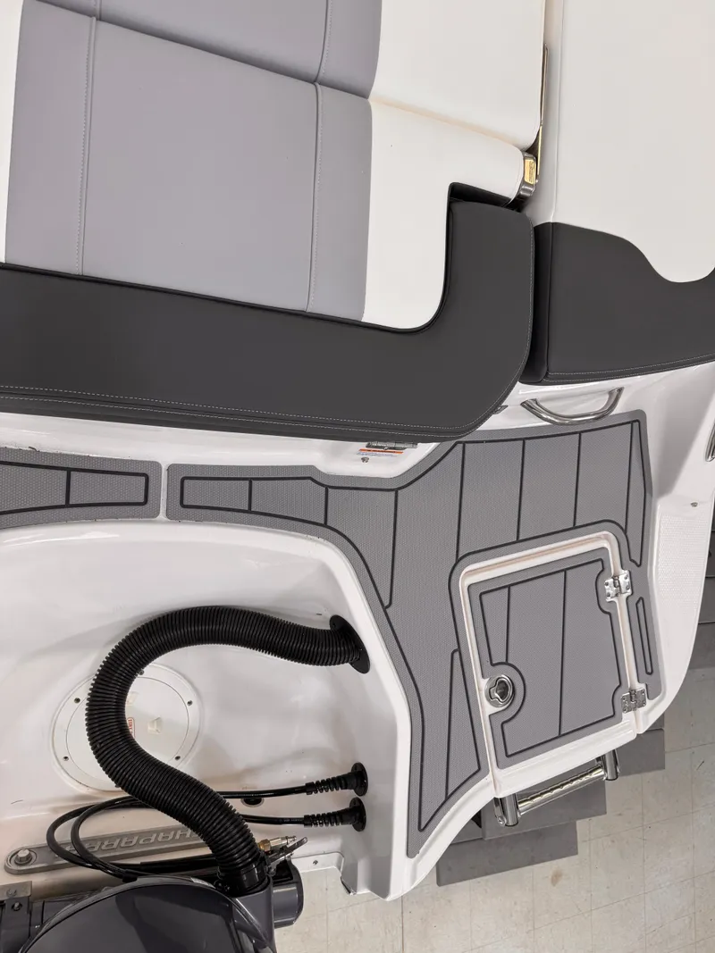 Slide: The Image of 2025 Chaparral 21 SSi OB boat interior with sleek seating and modern design. - 28