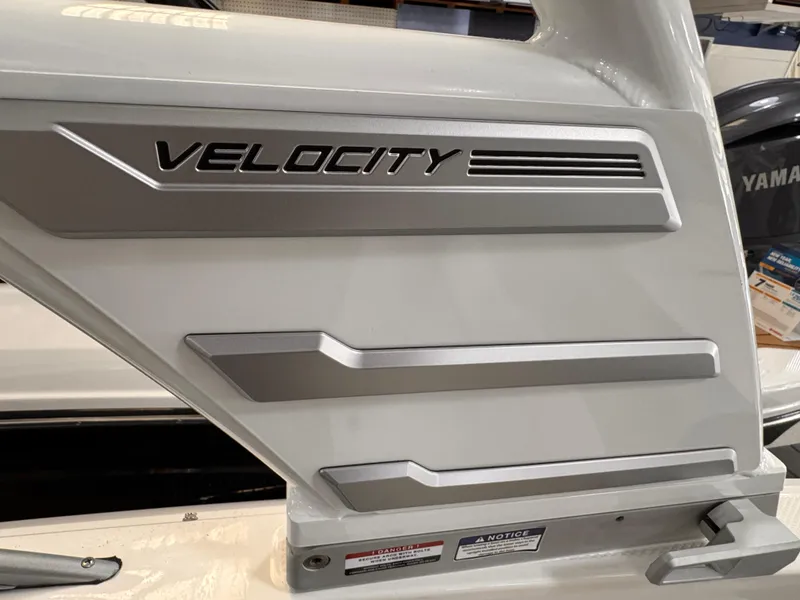 Slide: The Image of 2025 Chaparral 21 SSi OB boat with "Velocity" branding and sleek design elements. - 36