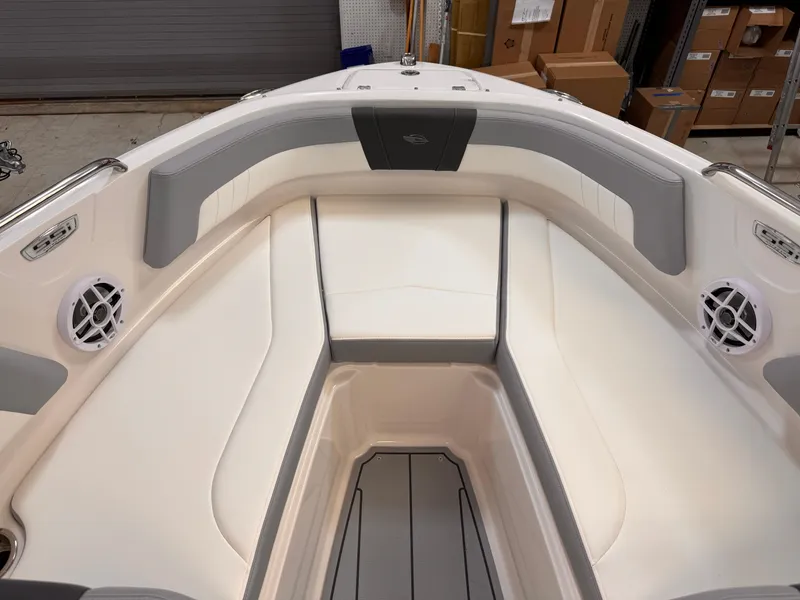 Slide: The Image of 2025 Chaparral 21 SSi OB boat interior with gray and white seating. - 37