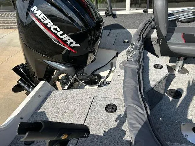 Slide: The Image of 2021 Tracker Pro Guide V-16 WT boat with Mercury engine, deck view. - 11