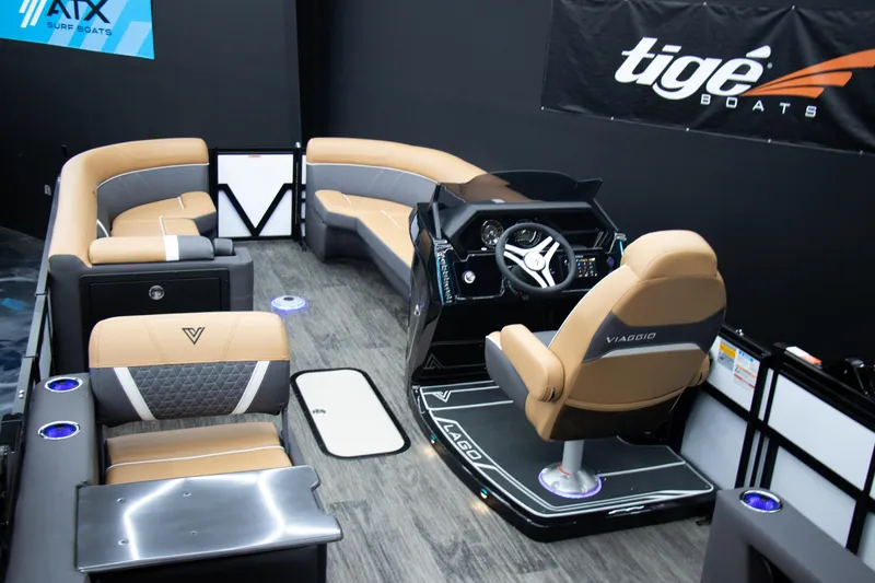 Slide: The Image of 2025 Viaggio Lago Z-S boat interior with luxurious seating and modern dashboard. - 11