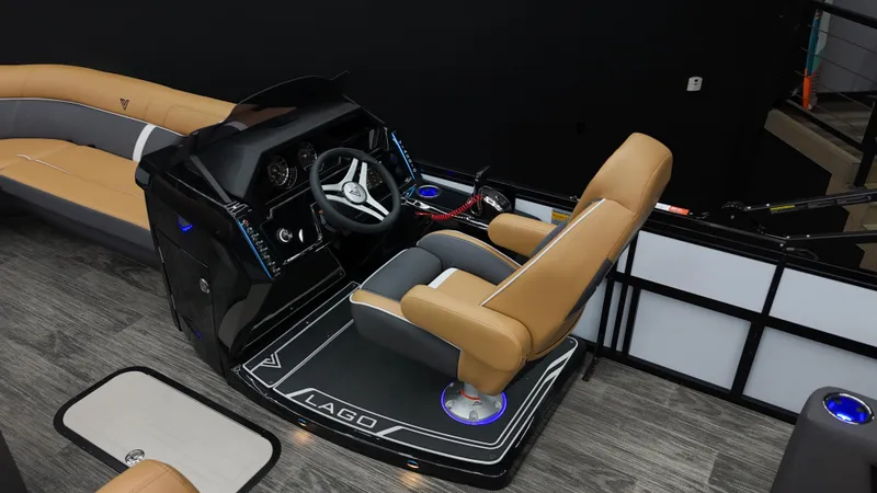 Slide: The Image of 2025 Viaggio Lago Z-S boat interior with modern helm and tan seating. - 15