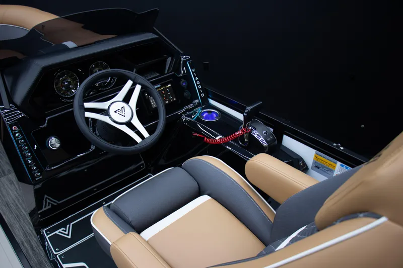 Slide: The Image of 2025 Viaggio Lago Z-S boat cockpit with modern steering wheel and luxurious seating. - 18