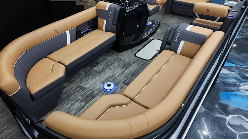 Slide: The Image of Luxurious interior of 2025 Viaggio Lago Z-S boat with tan and gray seating. - 2