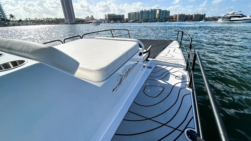 Slide: The Image of 2025 Pontoon Harpoon boat on water, featuring sleek design and comfortable seating. - 17
