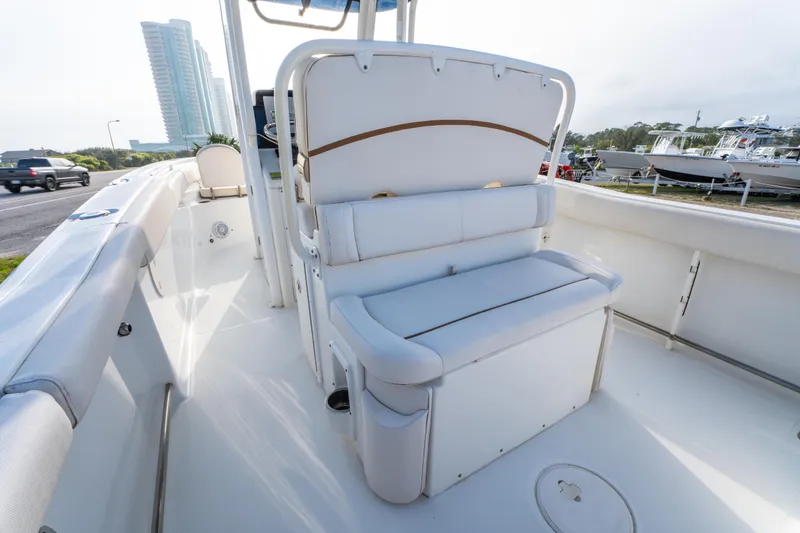 Slide: The Image of 2018 Sea Hunt 255 SE boat interior with white seating and modern design. - 16