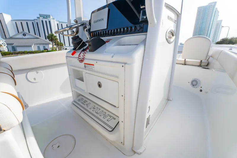 Slide: The Image of 2018 Sea Hunt 255 SE boat interior with Garmin navigation system and modern console. - 18