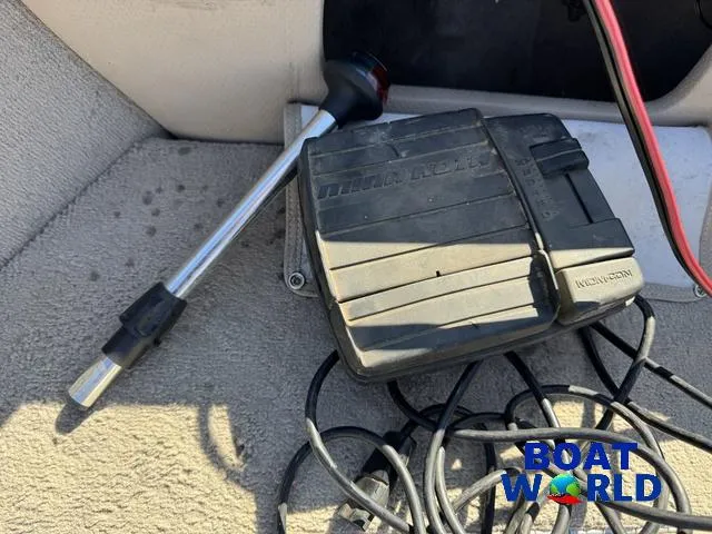 Slide: The Image of Foot pedal and cables on a 2002 Crestliner Super Hawk 1700 boat. - 16