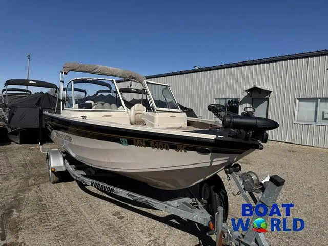 Slide: The Image of 2002 Crestliner Super Hawk 1700 boat on trailer at Boat World dealership. - 17