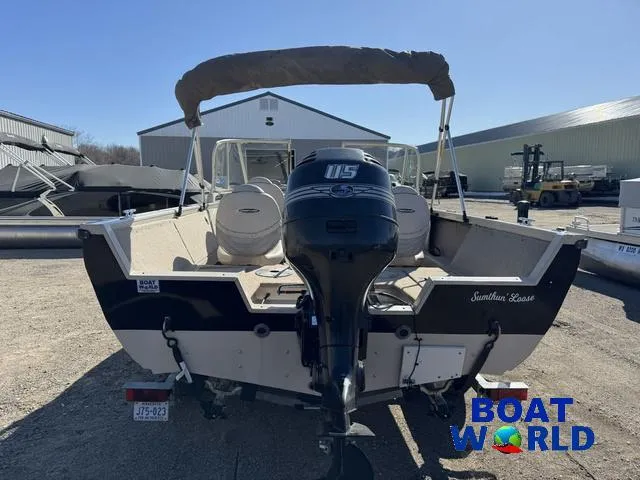 Slide: The Image of 2002 Crestliner Super Hawk 1700 boat with outboard motor, displayed at Boat World dealership. - 46