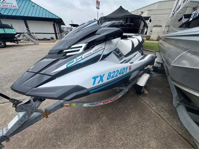 Slide: The Image of 2018 Yamaha Waverunner FX Cruiser HO on trailer, parked outdoors. - 4