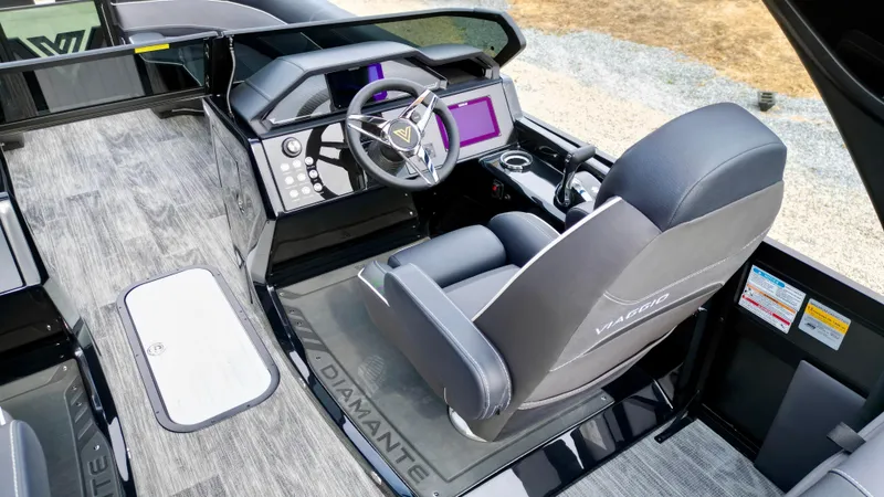 Slide: The Image of 2025 Viaggio Diamante UWA boat interior with modern steering and control panel. - 6