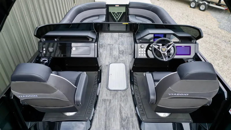 Slide: The Image of Interior of 2025 Viaggio Diamante UWA boat with modern seating and control panels. - 8
