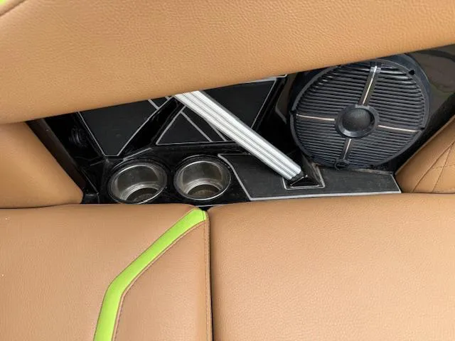 Slide: The Image of Interior of 2022 Tigé 24 RZK boat with cup holders and speaker. - 10