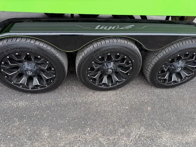 Slide: The Image of Triple axle trailer with black wheels for 2022 Tigé 24 RZK boat. - 3