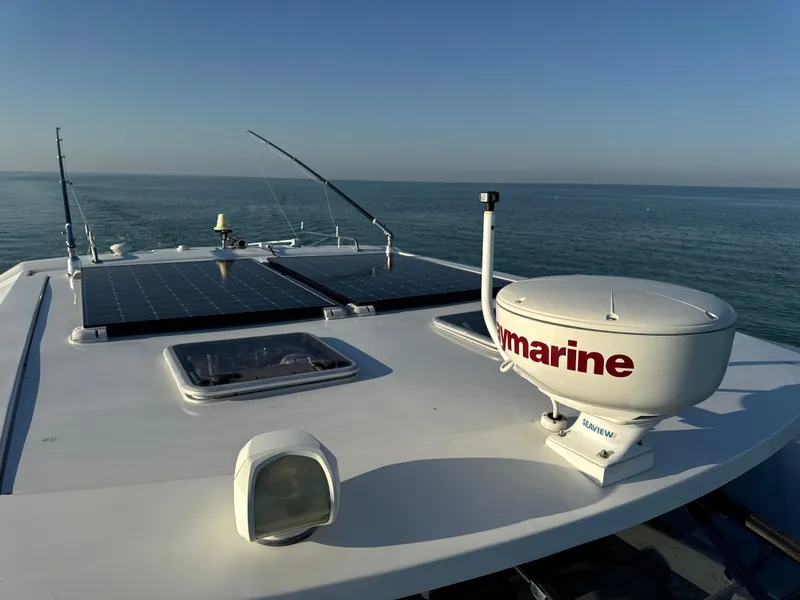 Slide: The Image of Aquila 36 Sport 2019 boat with solar panels and marine equipment on deck. - 16