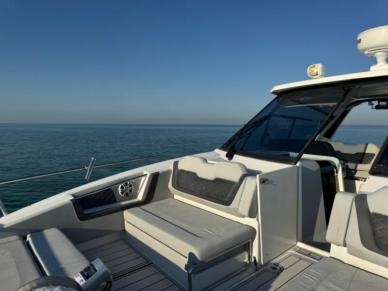 Slide: The Image of Aquila 36 Sport 2019 yacht on calm sea, featuring sleek seating and modern design. - 20