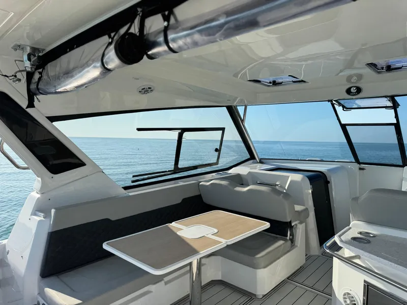 Slide: The Image of Interior of 2019 Aquila 36 Sport yacht with ocean view through windows. - 31