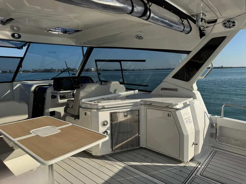Slide: The Image of Interior of 2019 Aquila 36 Sport yacht with modern seating and ocean view. - 32