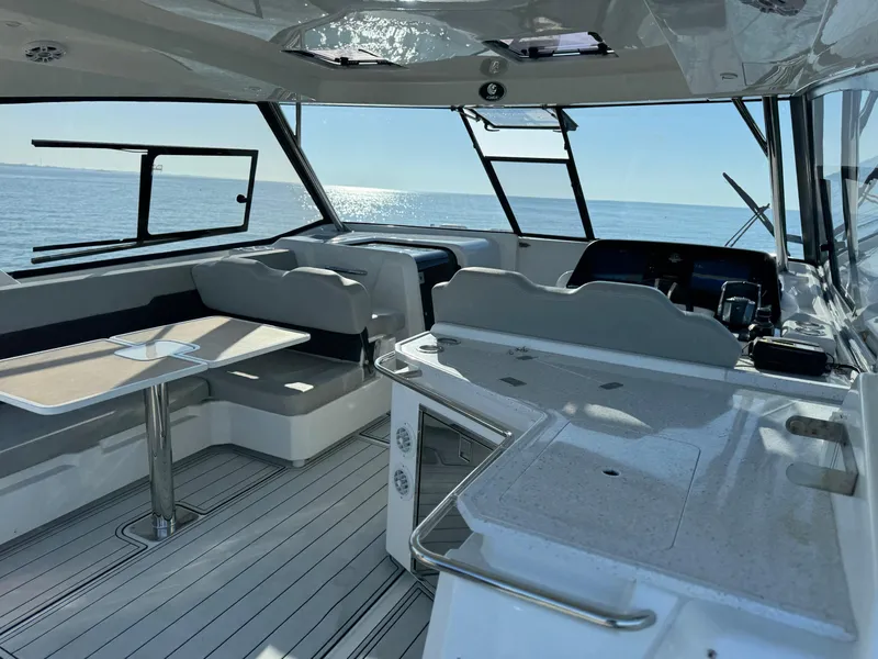 Slide: The Image of Interior of 2019 Aquila 36 Sport yacht with seating and ocean view. - 36